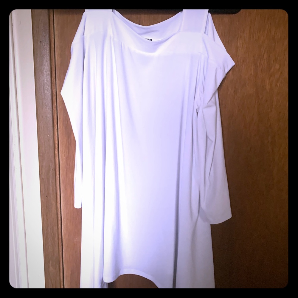 Cold shoulder tunic. Worn once.No stains.